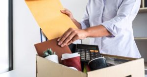 lady packing up her office into a box