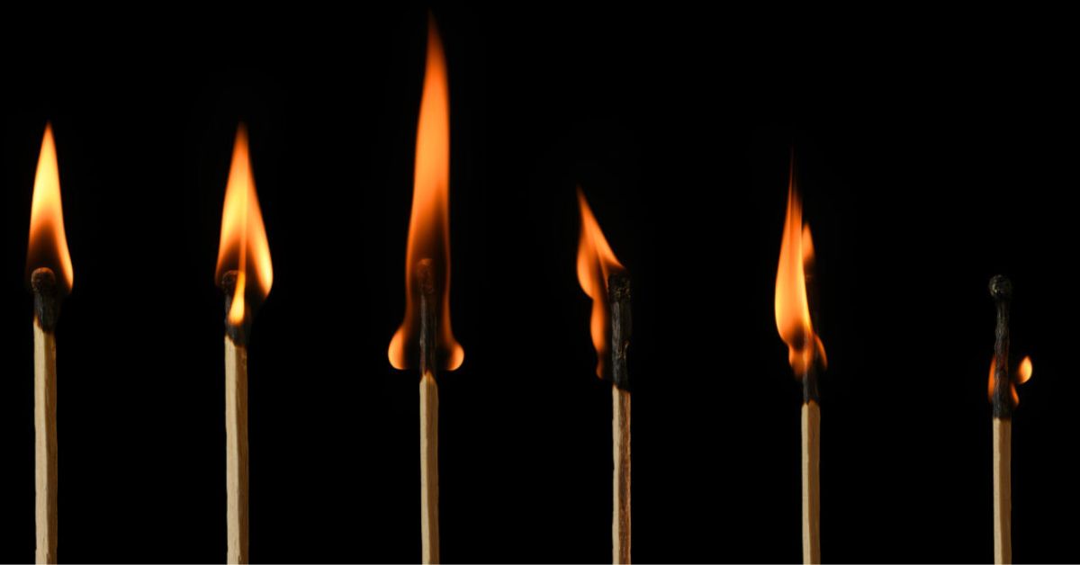 Candles burning representing burnout